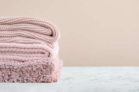 Soft warm plaids on tableの写真素材