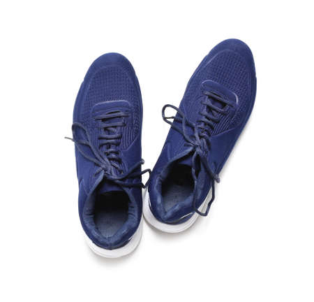 Pair of sport shoes on white background
