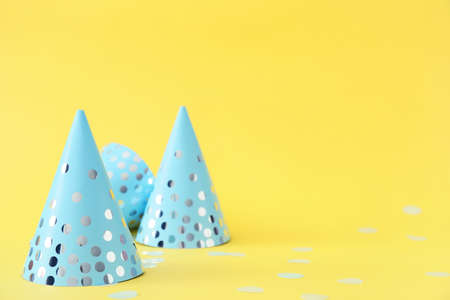 Party hats on color backgroundの写真素材