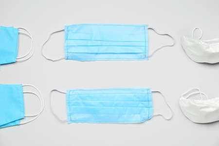 Medical masks on light backgroundの写真素材