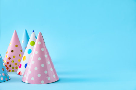 Party hats on color backgroundの写真素材