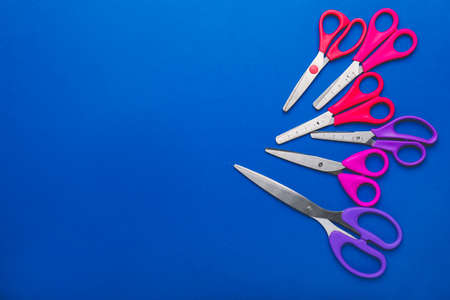 Scissors for paper on color backgroundの写真素材