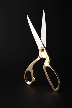 Scissors for paper on dark backgroundの写真素材