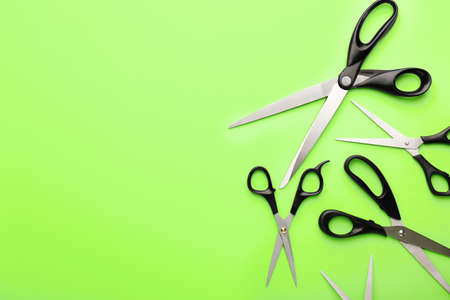 Scissors for paper on color background