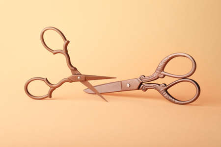 Scissors for paper on color background