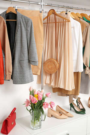 Modern wardrobe with stylish spring clothes and accessoriesの写真素材
