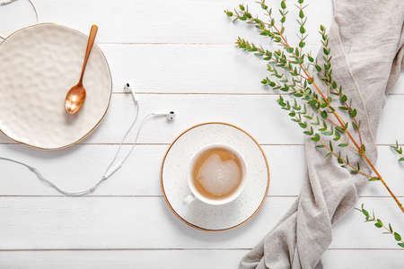 Cup of coffee on white wooden backgroundの写真素材
