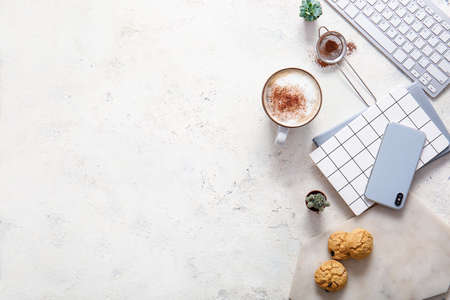 Flat lay composition with cup of coffee on white background
