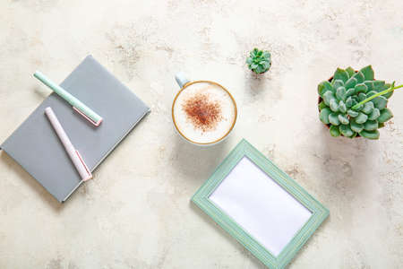 Flat lay composition with cup of coffee on white background