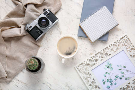 Flat lay composition with cup of coffee on white backgroundの写真素材