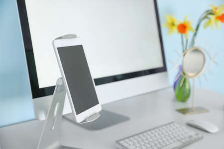 Modern workplace with computer in roomの写真素材