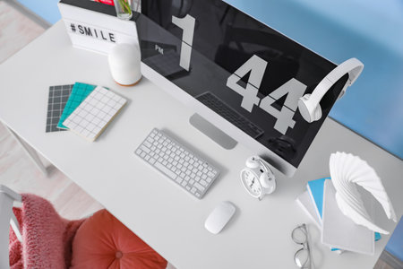 Modern workplace with computer in roomの写真素材