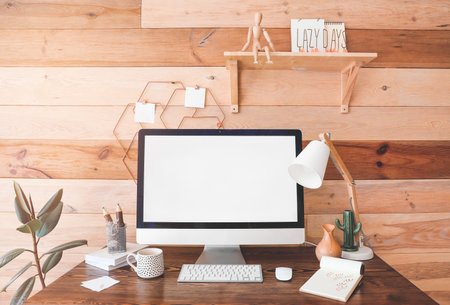 Modern workplace with computer in roomの写真素材