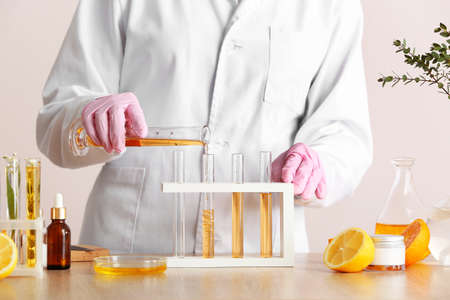 Beautician preparing natural cosmetic closeup