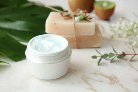 Jar of natural cream on table