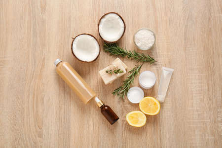 Natural cosmetics with ingredients on table