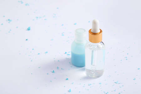 Bottles of natural cosmetics on white backgroundの写真素材