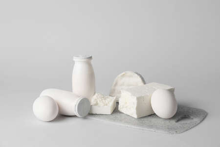 Different dairy products without lactose on gray backgroundの写真素材