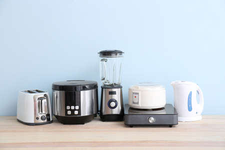 Different household appliances on tableの写真素材