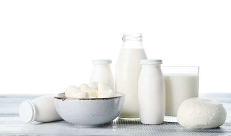 Different dairy products on table against white backgroundの写真素材