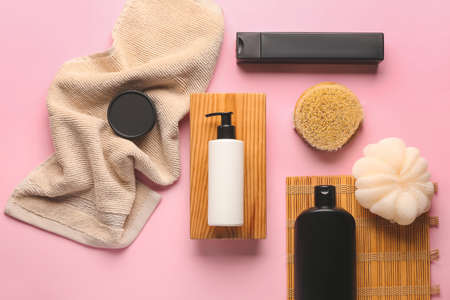 Set of bath accessories on color background