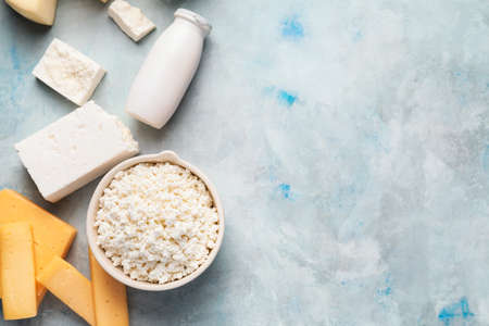 Different dairy products on color backgroundの写真素材