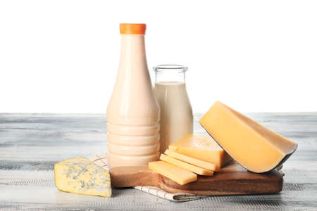 Different dairy products on table against white backgroundの写真素材
