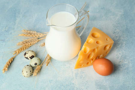 Different dairy products on color backgroundの写真素材