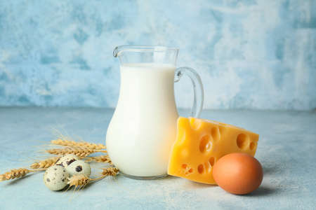 Different dairy products on color backgroundの写真素材