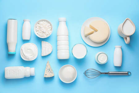 Different dairy products on color backgroundの写真素材
