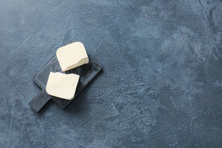 Tasty feta cheese on dark backgroundの写真素材