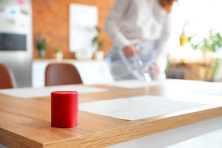 Smart home assistant device on table in kitchenの写真素材