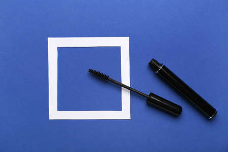 Black mascara on color background