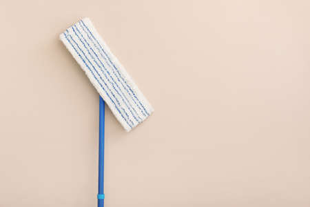 Floor mop on color backgroundの写真素材