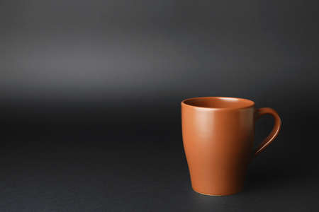 Empty cup on dark backgroundの写真素材