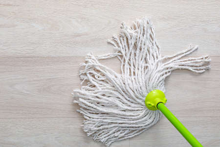Cleaning of floor with mop background.の写真素材