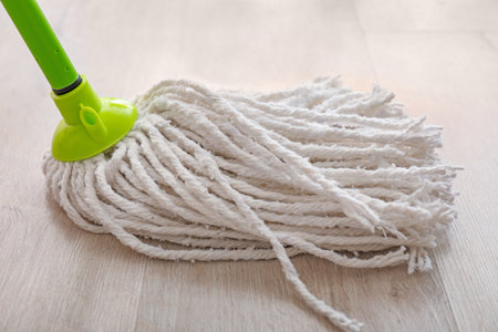 Cleaning of floor with mopの写真素材