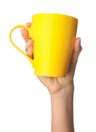 Female hand with Empty cup on white backgroundの写真素材