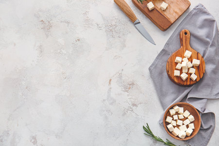 Composition with tasty cut feta cheese on tableの写真素材