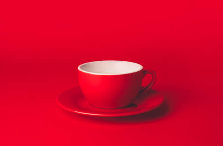 Blank cup on color backgroundの写真素材