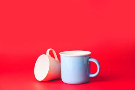 Blank cups on color backgroundの写真素材