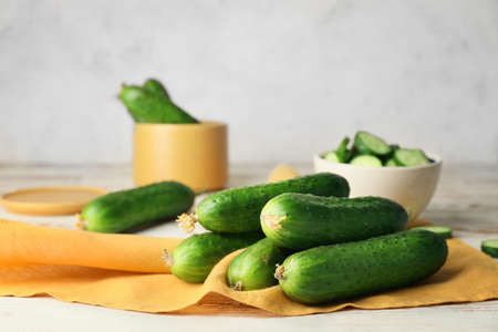 Green cucumbers on wooden tableの写真素材
