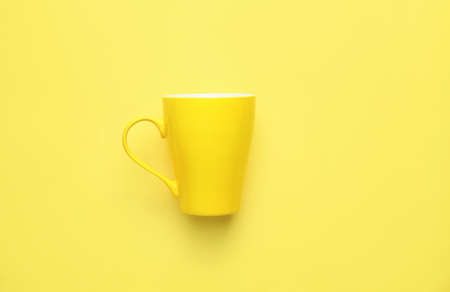 Blank cup on color backgroundの写真素材