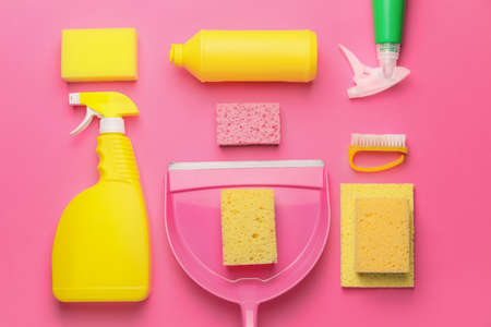 Set of cleaning supplies on color backgroundの写真素材