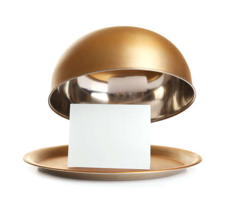 Tray and cloche with paper sheet on white backgroundの写真素材