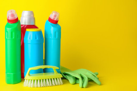 Set of cleaning supplies on color backgroundの写真素材