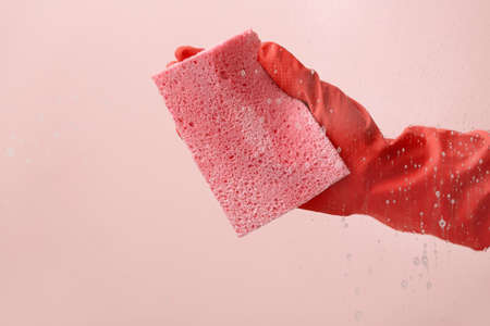 Housewife cleaning window at homeの写真素材