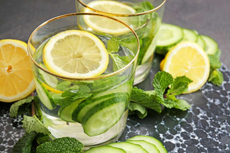 Glasses of infused cucumber water on tableの写真素材
