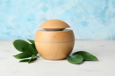 Aroma oil diffuser on color backgroundの写真素材