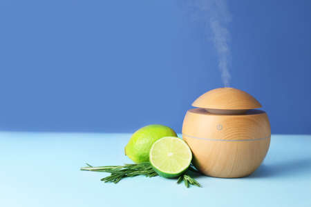 Aroma oil diffuser on color backgroundの写真素材